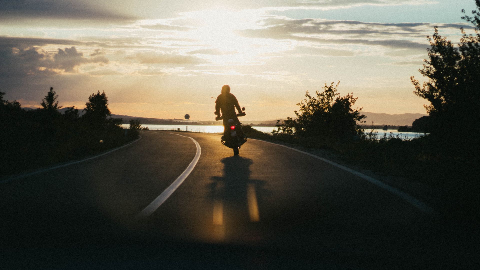 Motorcyclist riding on a West Virginia road